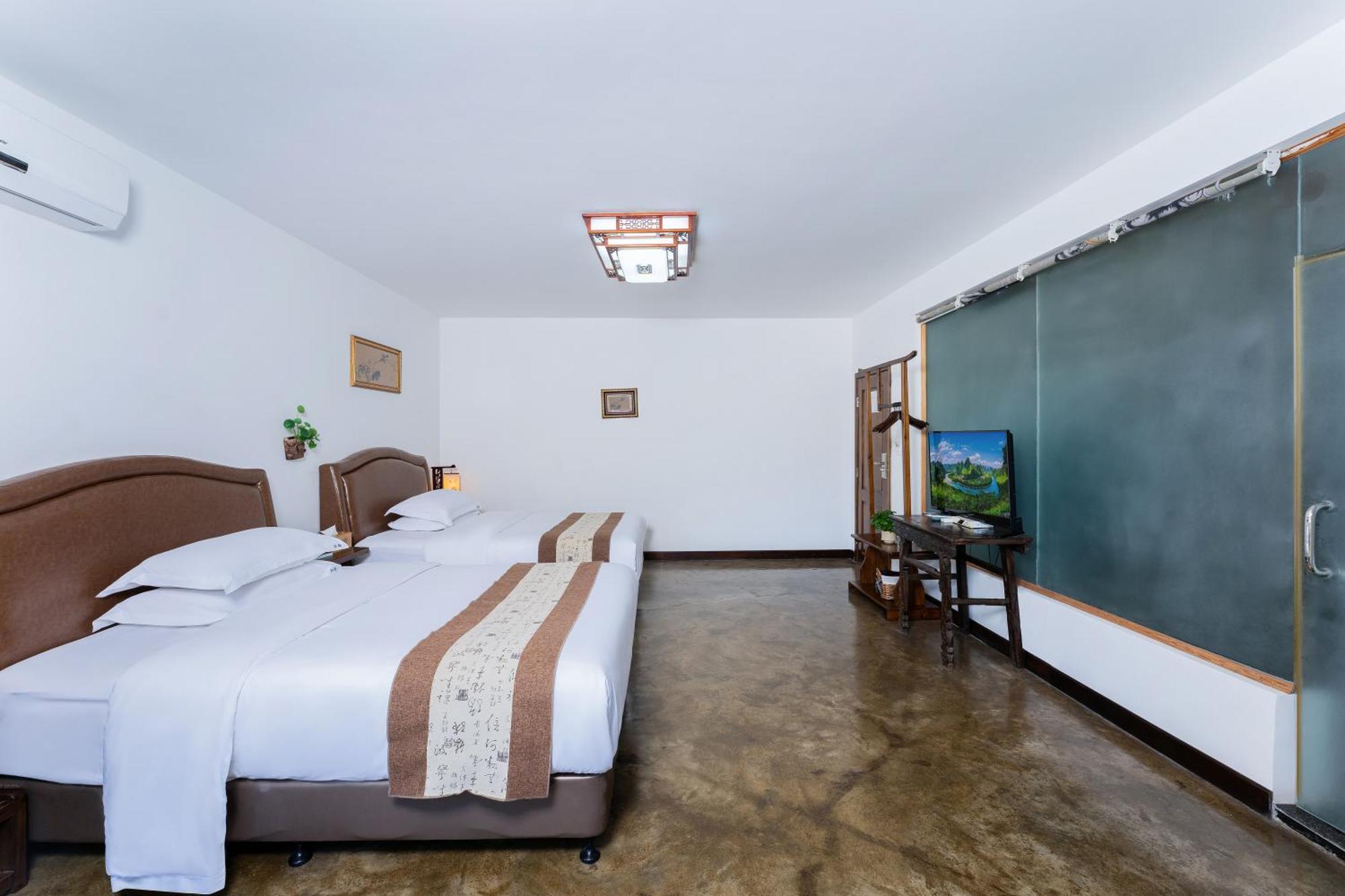 Leisure Courtyard Hotel Yangshuo-Free Shuttle Bus To Yangshuo Station Stay 2 Nights One Way ภายนอก รูปภาพ
